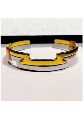 Vintage Avon Gold and Silver Interlocking Cuff Bracelet